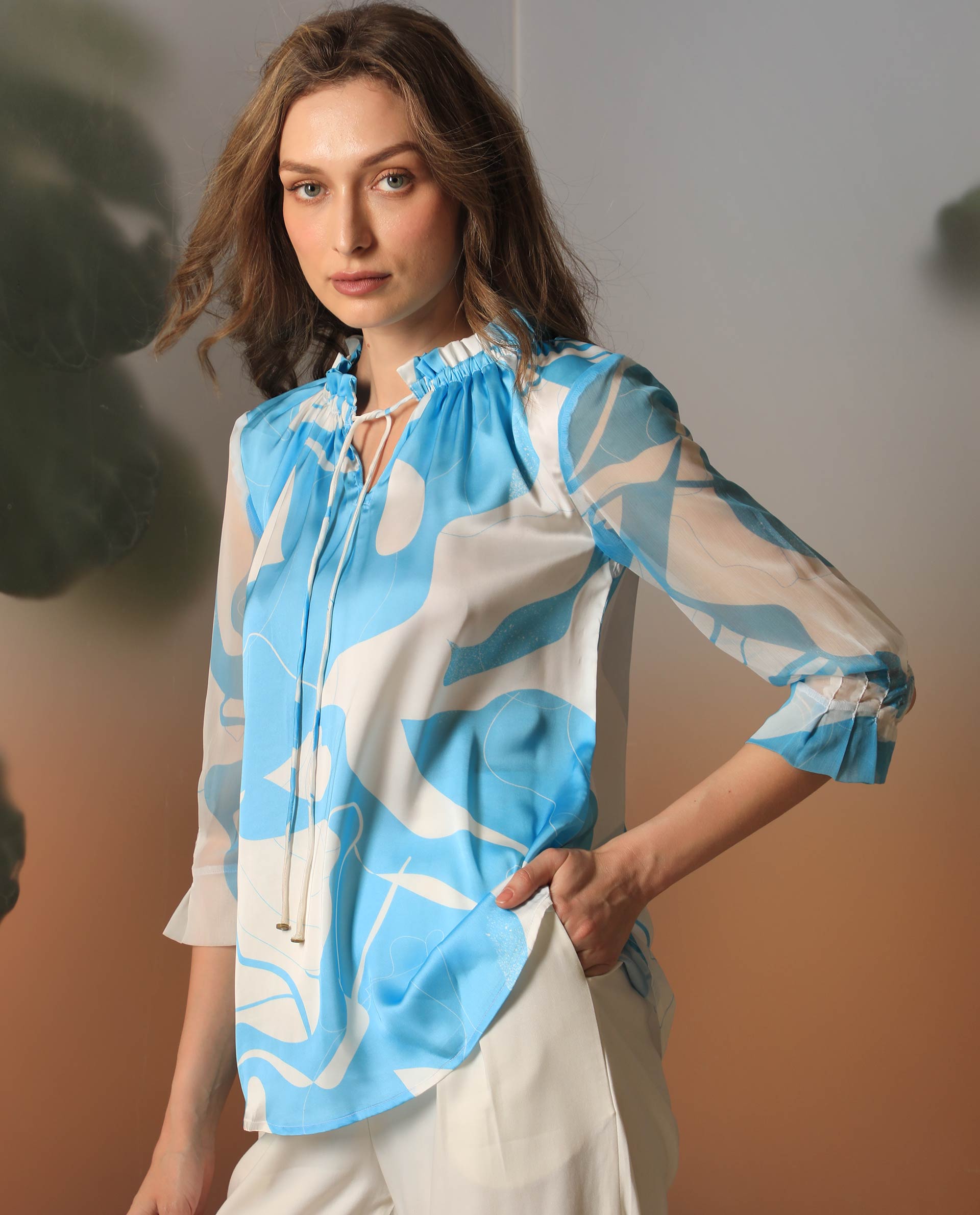 Women'S Meara Blue Polyester Fabric 3/4Th Sleeves Tie-Up Neck Ruffled Sleeves Regular Fit Abstract Print Top